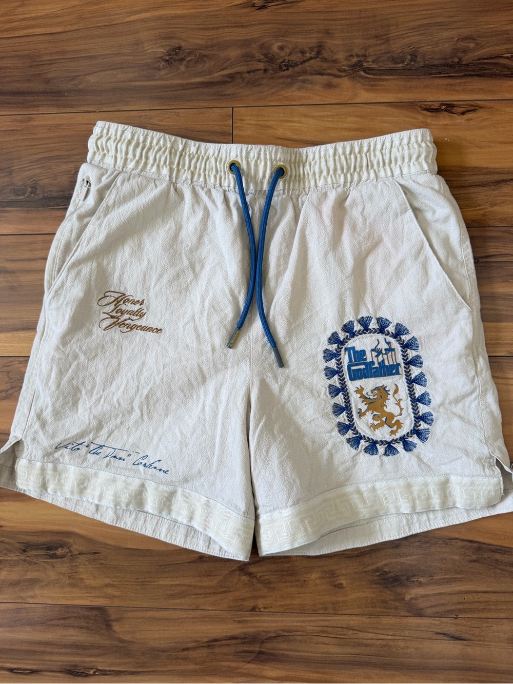 The Shoe Palace x The God Father Cream Embroidered Crest Drawstring Shorts